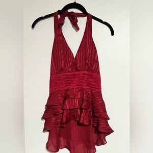 Silky sheer halter blouse with back zip.